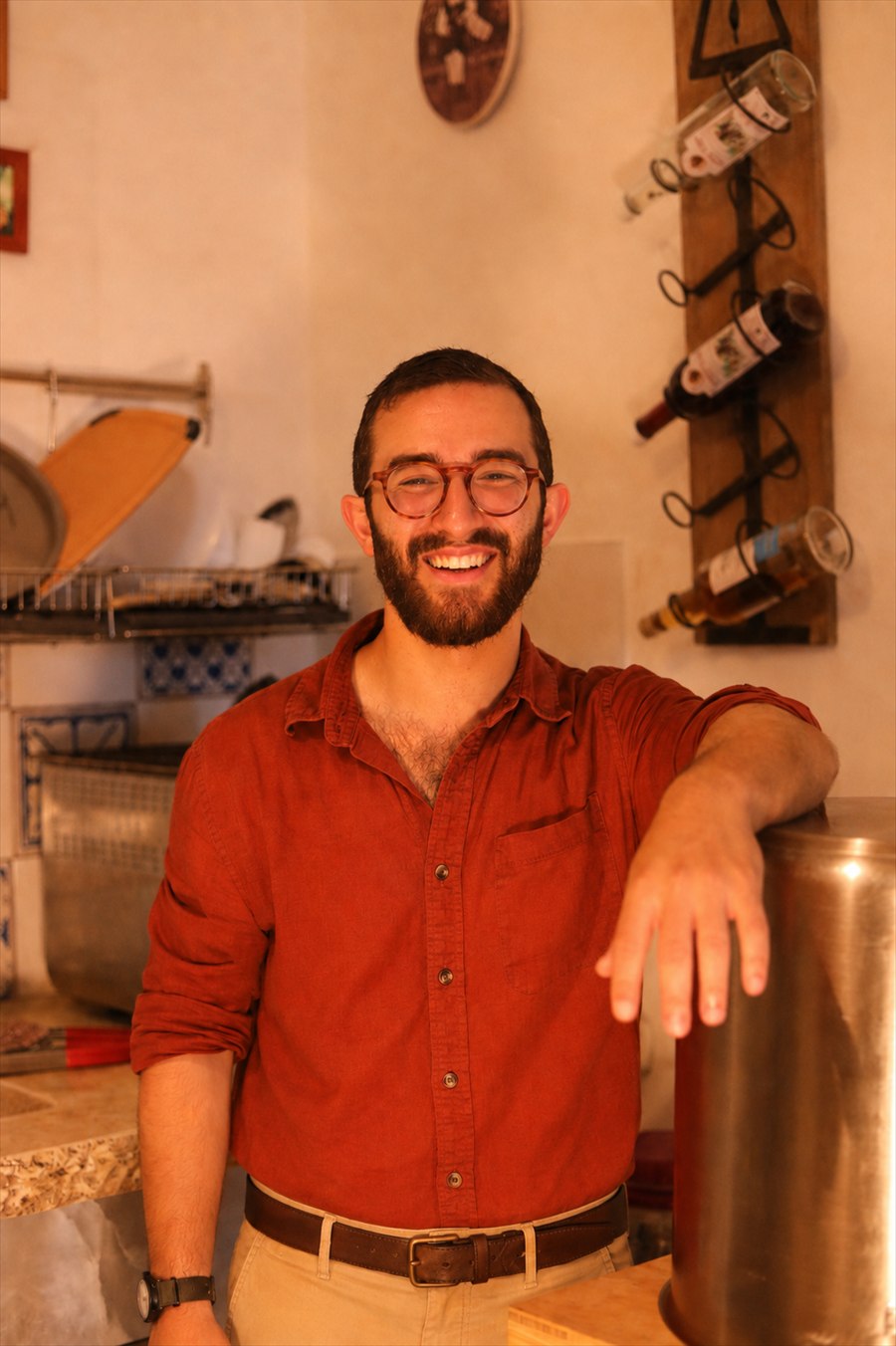 Shimi beside his large broth pot on cooking day.